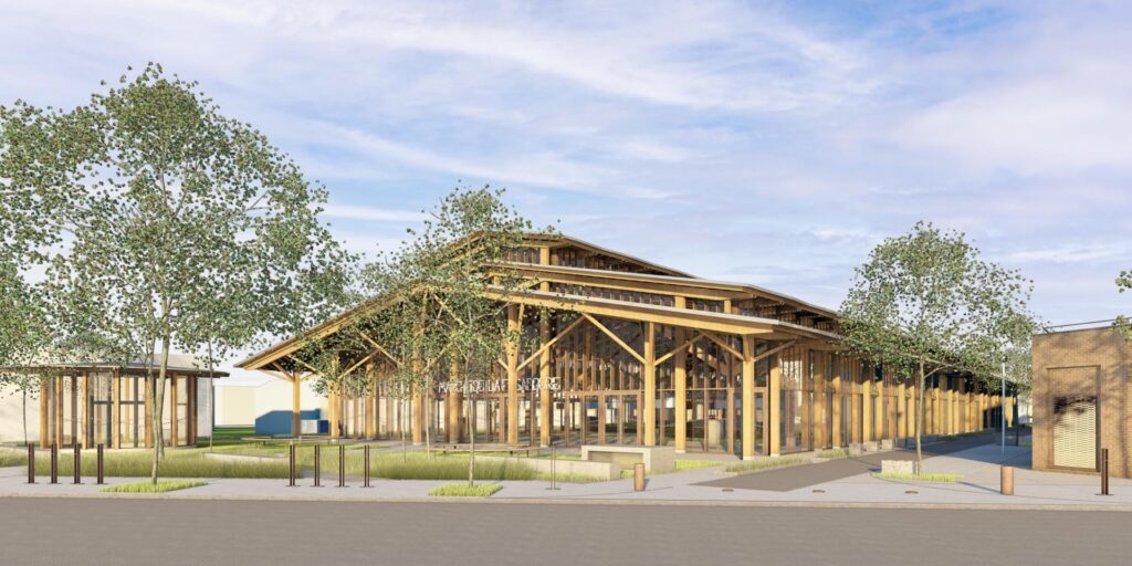 La perspective montre le projet de future hall du marché tout en bois et en verre. Un parvis végétalisé sera aménagé à l'entrée de la hall. - Agrandir l'image, fenêtre modale